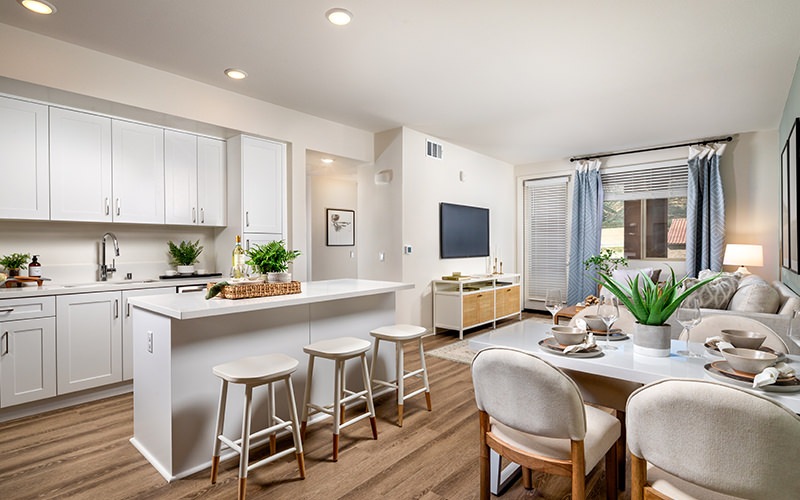 kitchen with white cupboards and stainless steel appliances