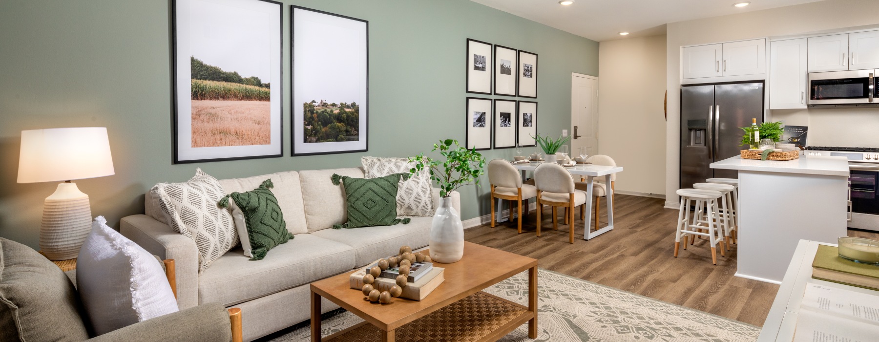 living room with couch coffee table and painting on  the wall