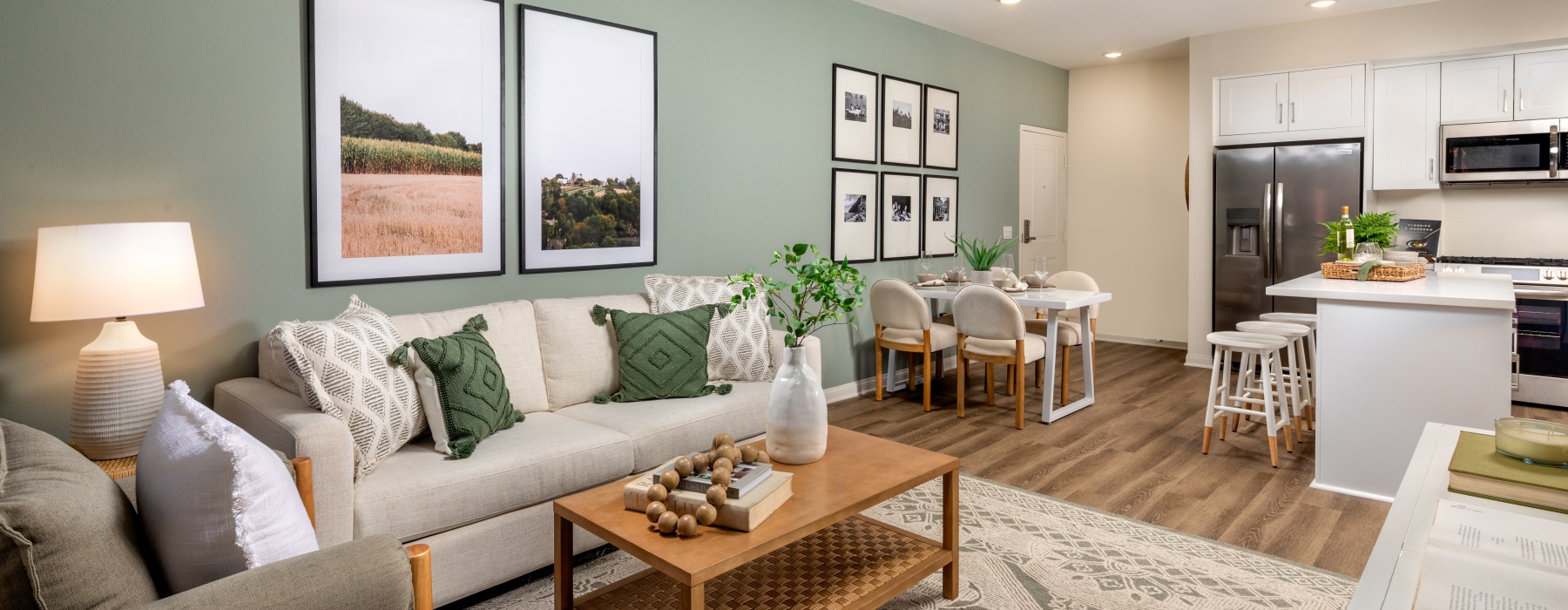 living room with couch coffee table and painting on  the wall
